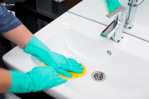 Local curtain cleaning team working in a Kingston property